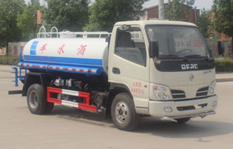 3噸灑水車價格多少_東風多利卡2.5噸藍牌綠化灑水車廠家價格